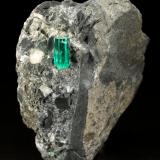 Beryl (variety emerald), Calcite, Pyrite<br />La Pita mining district, Municipio Maripí, Western Emerald Belt, Boyacá Department, Colombia<br />38x63x65mm, xl=10mm<br /> (Author: Fiebre Verde)