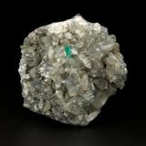 Beryl (variety emerald), Calcite, Dolomite<br />Muzo mining district, Western Emerald Belt, Boyacá Department, Colombia<br />54x53x31mm, xl=5mm<br /> (Author: Fiebre Verde)