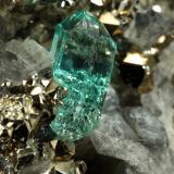 Beryl (variety emerald), Calcite, Pyrite<br />Chivor mining district, El Acuario Mine, Municipio Chivor, Eastern Emerald Belt, Boyacá Department, Colombia<br />33x41x21mm, xl=8mm<br /> (Author: Fiebre Verde)