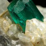 Beryl (variety emerald), Calcite, Dolomite, Pyrite<br />Chivor mining district, Municipio Chivor, Eastern Emerald Belt, Boyacá Department, Colombia<br />50x39x20mm, xl=10mm<br /> (Author: Fiebre Verde)