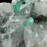 Beryl (variety emerald), Calcite<br />La Pita mining district, Municipio Maripí, Western Emerald Belt, Boyacá Department, Colombia<br />49x44x36mm, xls=6 & 4mm<br /> (Author: Fiebre Verde)