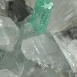 Beryl (variety emerald), Calcite<br />La Pita mining district, Municipio Maripí, Western Emerald Belt, Boyacá Department, Colombia<br />49x44x36mm, xls=6 & 4mm<br /> (Author: Fiebre Verde)