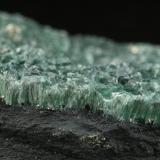 Muscovite (variety fuchsite), Pyrite<br /> 	Highway Pauna-San Pablo de Borbur road works ("Highway Mine"), Municipio Pauna, Western Emerald Belt, Boyacá Department, Colombia<br />55x32x11mm<br /> (Author: Fiebre Verde)