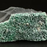 Muscovite (variety fuchsite), PyriteTrabajos en carretera Pauna-San Pablo de Borbur (Mina de la Carretera), Municipio Pauna, Cinturón Esmeraldífero Occidental, Departamento Boyacá, Colombia55x32x11mm (Author: Fiebre Verde)