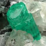 Beryl (variety emerald), Calcite, Pyrite<br />Muzo mining district, Western Emerald Belt, Boyacá Department, Colombia<br />65x90x85mm, aggregate=14x9mm<br /> (Author: Fiebre Verde)