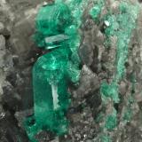 Beryl (variety emerald), Calcite, Dolomite<br />La Pita mining district, Municipio Maripí, Western Emerald Belt, Boyacá Department, Colombia<br />120x83x68mm, main xl=14mm<br /> (Author: Fiebre Verde)