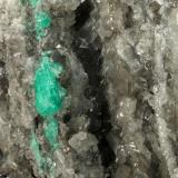 Beryl (variety emerald), Calcite, Dolomite<br />La Pita mining district, Municipio Maripí, Western Emerald Belt, Boyacá Department, Colombia<br />120x83x68mm, main xl=14mm<br /> (Author: Fiebre Verde)