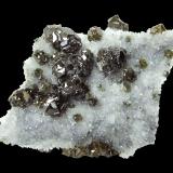 Sphalerite (variety cleiophane), QuartzKrushev dol deposit, Krushev dol Mine, Madan mining area, Rhodope Mountains, Smolyan Oblast, BulgariaSpecimen size 7 cm, largest crystal 8 mm (Author: Tobi)