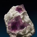 Fluorite on Barite<br />La Cabaña, Berbes mining area, Valdelmar, Berbes, Ribadesella, Comarca Oriente, Principality of Asturias (Asturias), Spain<br />8cm<br /> (Author: Gail)