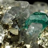 Beryl (variety emerald), Dolomite, Pyrite<br />Chivor mining district, El Acuario Mine, Municipio Chivor, Eastern Emerald Belt, Boyacá Department, Colombia<br />68x66x35mm, xls up to 10mm<br /> (Author: Fiebre Verde)