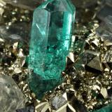 Beryl (variety emerald), Dolomite, Pyrite<br />Chivor mining district, El Acuario Mine, Municipio Chivor, Eastern Emerald Belt, Boyacá Department, Colombia<br />68x66x35mm, xls up to 10mm<br /> (Author: Fiebre Verde)