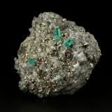 Beryl (variety emerald), Dolomite, Pyrite<br />Chivor mining district, El Acuario Mine, Municipio Chivor, Eastern Emerald Belt, Boyacá Department, Colombia<br />68x66x35mm, xls up to 10mm<br /> (Author: Fiebre Verde)