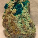Dioptase, Wulfenite<br />Mammoth-St. Anthony Mine, St. Anthony deposit, Tiger, Mammoth District, Pinal County, Arizona, USA<br />4.48 x 3.6 x 3.14 cm<br /> (Author: JC)