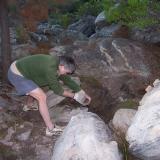 Me removing a large rock of sandstone. (Author: Pierre Joubert)