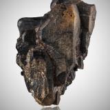 Gadolinite<br />Slobrekka Pegmatite, Frikstad, Iveland, Aust-Agder, Norway<br />9,0	x	14,5	x	8,0	cm<br /> (Author: MIM Museum)