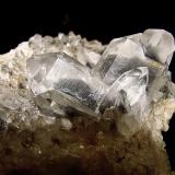 Quartz (Japan Law twin)Wegner Quartz Crystal Mines, Mount Ida, Montgomery County, Arkansas, USAspecimen is 6.5 cm, Largest quartz crystals are 2.5 cm (Author: Bob Harman)