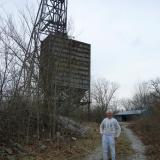 _Yes, that is me in early April, 2005.
The Annabel Lee head frame is in the background. (Author: Bob Harman)