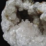Opal (variety hyalite) on quartz<br />Monroe County, Indiana, USA<br />opal area is 2 cm<br /> (Author: Bob Harman)
