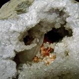 Quartz with Calcite and DolomiteAfloramientos Carretera Estatal 37, Harrodsburg, Clear Creek, Condado Monroe, Indiana, USAthe quartz "stalactite" is 2.6 cm (Author: Bob Harman)