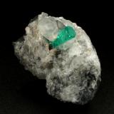 Beryl (variety emerald), Calcite, Dolomite<br />La Pita mining district, Municipio Maripí, Western Emerald Belt, Boyacá Department, Colombia<br />32x28x22mm, xl=11mm<br /> (Author: Fiebre Verde)