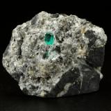 Beryl (variety emerald), Calcite, Pyrite<br />Chivor mining district, Municipio Chivor, Eastern Emerald Belt, Boyacá Department, Colombia<br />45x36x29mm, xl=4mm<br /> (Author: Fiebre Verde)