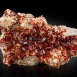 Vanadinite on Baryte<br />Mibladen (Mibladen mining district), Midelt, Midelt Province, Drâa-Tafilalet Region, Morocco<br />25,0	x	17,0	x	10,0	cm<br /> (Author: MIM Museum)