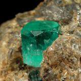 Beryl (variety emerald), Calcite, Dolomite, Pyrite<br />Chivor mining district, Municipio Chivor, Eastern Emerald Belt, Boyacá Department, Colombia<br />33x37x40mm, xl=8mm<br /> (Author: Fiebre Verde)