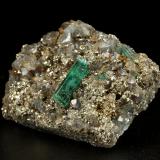 Beryl (variety emerald), Dolomite, Pyrite<br />Chivor mining district, Palo Arañado Mine, Municipio Chivor, Eastern Emerald Belt, Boyacá Department, Colombia<br />35x27x12mm, main xl=11mm<br /> (Author: Fiebre Verde)