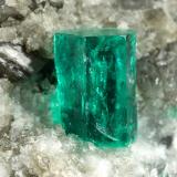 Beryl (variety emerald), Calcite, Dolomite<br />La Pita mining district, Cunas Mine, Municipio Maripí, Western Emerald Belt, Boyacá Department, Colombia<br />38x58x47mm, xl=9mm<br /> (Author: Fiebre Verde)