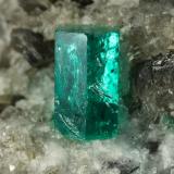 Beryl (variety emerald), Calcite, Dolomite<br />La Pita mining district, Cunas Mine, Municipio Maripí, Western Emerald Belt, Boyacá Department, Colombia<br />38x58x47mm, xl=9mm<br /> (Author: Fiebre Verde)