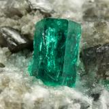 Beryl (variety emerald), Calcite, Dolomite<br />La Pita mining district, Cunas Mine, Municipio Maripí, Western Emerald Belt, Boyacá Department, Colombia<br />38x58x47mm, xl=9mm<br /> (Author: Fiebre Verde)