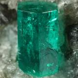 Beryl (variety emerald), Calcite, Dolomite<br />La Pita mining district, Cunas Mine, Municipio Maripí, Western Emerald Belt, Boyacá Department, Colombia<br />38x58x47mm, xl=9mm<br /> (Author: Fiebre Verde)