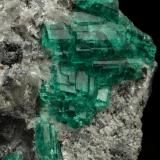 Beryl (variety emerald), Calcite<br />Muzo mining district, Western Emerald Belt, Boyacá Department, Colombia<br />55x53x29mm, aggregate=21x27mm<br /> (Author: Fiebre Verde)