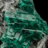 Beryl (variety emerald), Calcite<br />Muzo mining district, Western Emerald Belt, Boyacá Department, Colombia<br />55x53x29mm, aggregate=21x27mm<br /> (Author: Fiebre Verde)