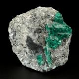 Beryl (variety emerald), Calcite<br />Muzo mining district, Western Emerald Belt, Boyacá Department, Colombia<br />55x53x29mm, aggregate=21x27mm<br /> (Author: Fiebre Verde)