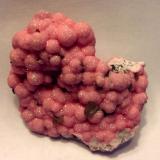 Rhodochrosite, Barite, ShigaiteZona minera N'Chwaning, Kuruman, Kalahari manganese field (KMF), Provincia Septentrional del Cabo, Sudáfrica5.4 cm (Author: JC)