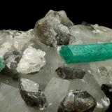 Beryl (variety emerald), Calcite, Dolomite<br />La Pita mining district, Cunas Mine, Municipio Maripí, Western Emerald Belt, Boyacá Department, Colombia<br />61x50x38mm, xls=22 & 17mm<br /> (Author: Fiebre Verde)