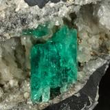 Beryl (variety emerald), Calcite, Quartz<br />Chivor mining district, Municipio Chivor, Eastern Emerald Belt, Boyacá Department, Colombia<br />120x55x28mm, aggregate=15x9mm<br /> (Author: Fiebre Verde)