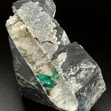 Beryl (variety emerald), Calcite, Quartz<br />Chivor mining district, Municipio Chivor, Eastern Emerald Belt, Boyacá Department, Colombia<br />120x55x28mm, aggregate=15x9mm<br /> (Author: Fiebre Verde)