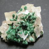 Malachite on Calcite<br />Tsumeb Mine, Tsumeb, Otjikoto Region, Namibia<br />35x35x15mm<br /> (Author: Heimo Hellwig)