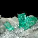 Beryl (variety emerald), Calcite, Quartz<br />Muzo mining district, Western Emerald Belt, Boyacá Department, Colombia<br />43x68x27mm, largest xl=8mm<br /> (Author: Fiebre Verde)