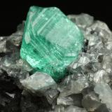 Beryl (variety emerald), Calcite, Dolomite<br />La Pita mining district, Municipio Maripí, Western Emerald Belt, Boyacá Department, Colombia<br />39x24x18mm, xl=9mm<br /> (Author: Fiebre Verde)