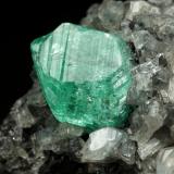 Beryl (variety emerald), Calcite, Dolomite<br />La Pita mining district, Municipio Maripí, Western Emerald Belt, Boyacá Department, Colombia<br />39x24x18mm, xl=9mm<br /> (Author: Fiebre Verde)