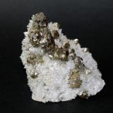 Sphalerite (variety cleiophane) on QuartzMina Krushev dol, Zona minera Madan, Montes Rhodope, Smolyan Oblast, Bulgaria70mm x 75mm x 60mm (Author: Philippe Durand)