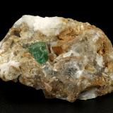 Beryl (variety emerald), Calcite<br />La Pita mining district, Polveros Mine, Municipio Maripí, Western Emerald Belt, Boyacá Department, Colombia<br />46x25x30mm, xl=7x7mm<br /> (Author: Fiebre Verde)