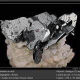 Hematite with rutile<br />Cavradi, Curnera Valley, Tujetsch (Tavetsch), Vorderrhein Valley, Grischun (Grisons; Graubünden), Switzerland<br />fpv 30 mm<br /> (Author: ploum)