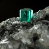 Beryl (variety emerald), Calcite, Dolomite<br />La Pita mining district, Municipio Maripí, Western Emerald Belt, Boyacá Department, Colombia<br />53x38x34mm, xl=5x4mm<br /> (Author: Fiebre Verde)