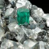 Beryl (variety emerald), Calcite, Dolomite<br />La Pita mining district, Municipio Maripí, Western Emerald Belt, Boyacá Department, Colombia<br />53x38x34mm, xl=5x4mm<br /> (Author: Fiebre Verde)