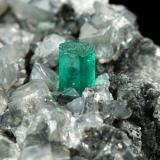 Beryl (variety emerald), Calcite, Dolomite<br />La Pita mining district, Municipio Maripí, Western Emerald Belt, Boyacá Department, Colombia<br />53x38x34mm, xl=5x4mm<br /> (Author: Fiebre Verde)