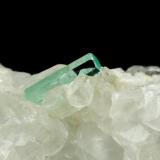 Beryl (variety emerald), Calcite<br />La Pita mining district, Municipio Maripí, Western Emerald Belt, Boyacá Department, Colombia<br />46x85x20mm, xls=26, 16 & 13mm<br /> (Author: Fiebre Verde)